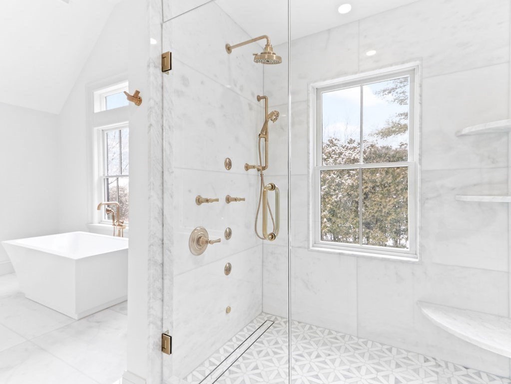 31 Karen Road Newton, MA 02468 - Photo 23 of 41 a bathroom with a shower a sink and a mirror