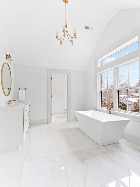 31 Karen Road Newton, MA 02468 - Photo 25 of 41 a very nice looking room with a large window and chandelier