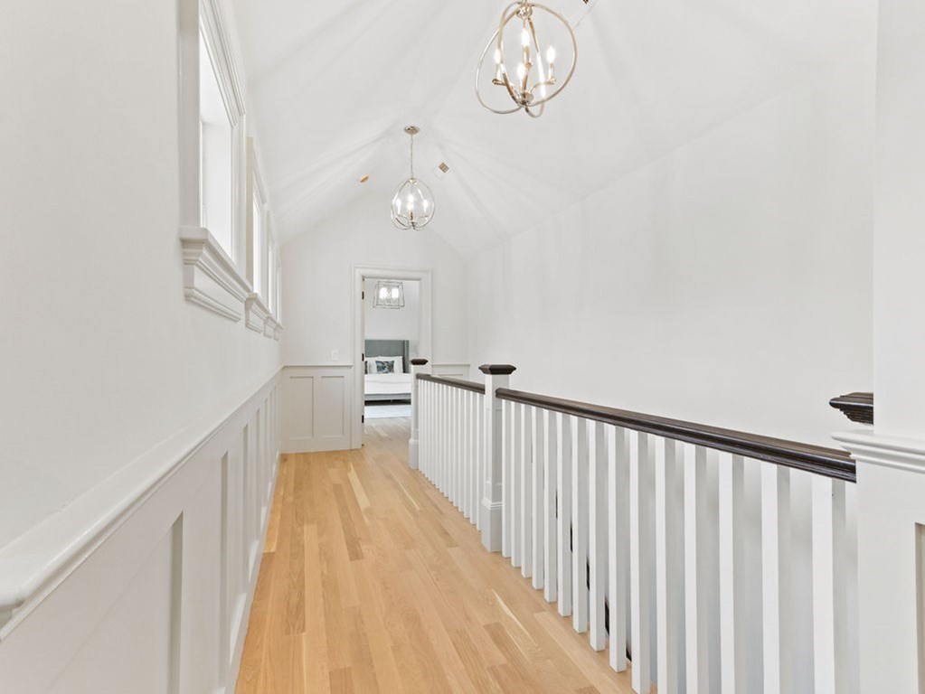 31 Karen Road Newton, MA 02468 - Photo 29 of 41 a view of a livingroom with wooden floor and stairs