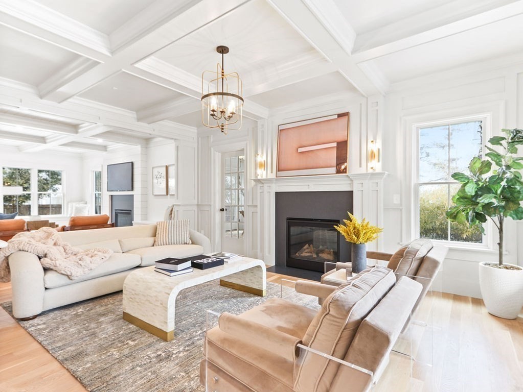 31 Karen Road Newton, MA 02468 - Photo 3 of 41 a living room with furniture fireplace and a chandelier