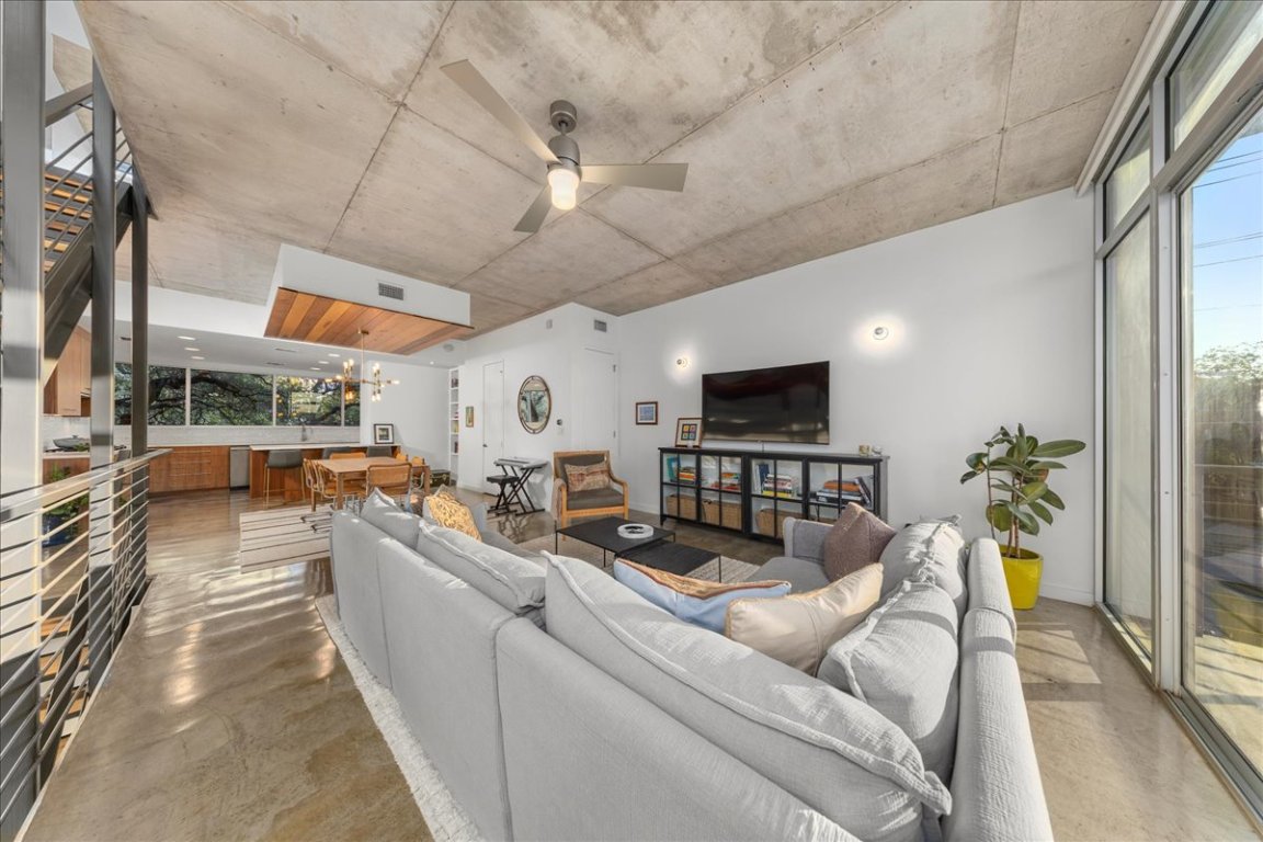 2301 South 5th Street, Unit 6 Austin, TX 78704 - Photo 17 of 40 a living room with furniture and a flat screen tv