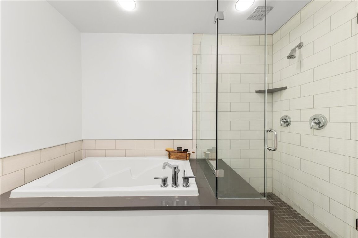 2301 South 5th Street, Unit 6 Austin, TX 78704 - Photo 29 of 40 a bathroom with a bathtub and shower