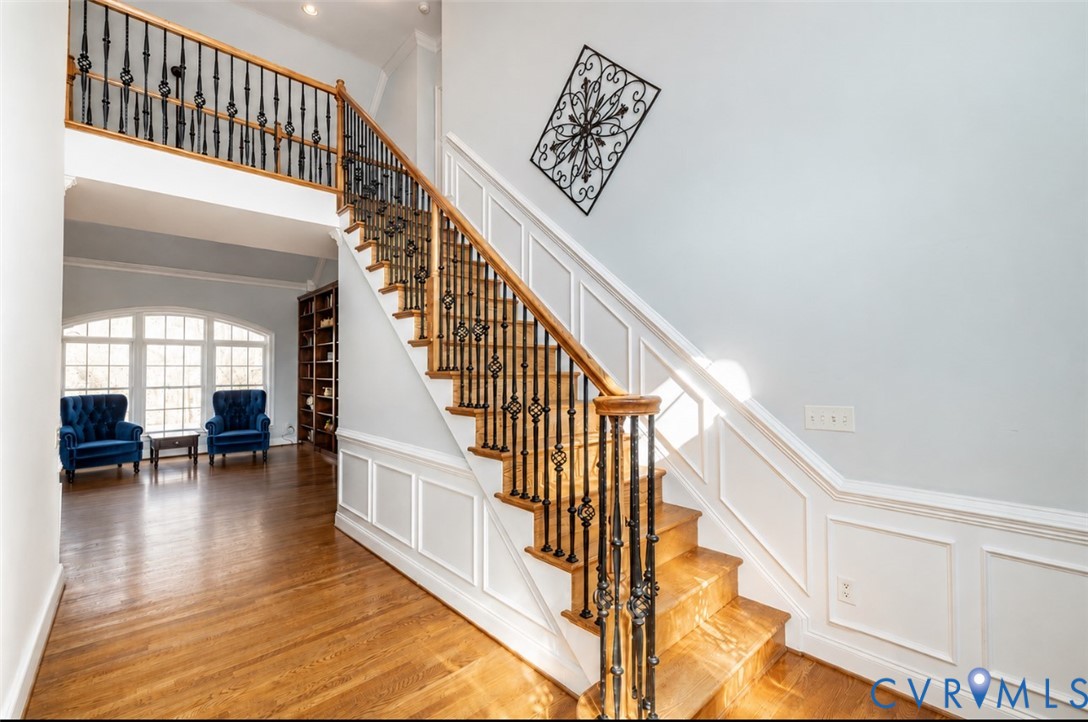 239 Jennings Road Cartersville, VA 23027 - Photo 7 of 26 Grand foyer featuring a natural wood staircase wit