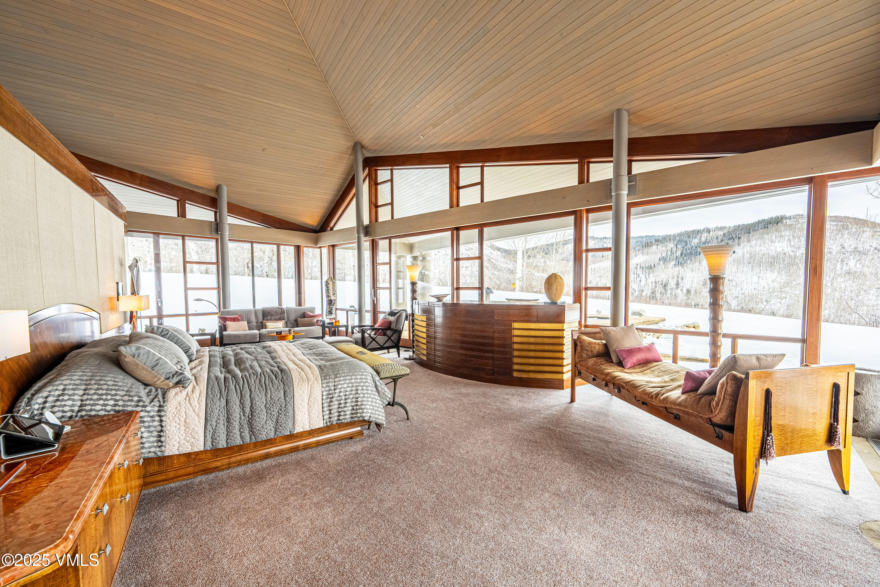 56 Rose Crown Avon, CO 81620 - Photo 14 of 39 a bedroom with furniture and large windows