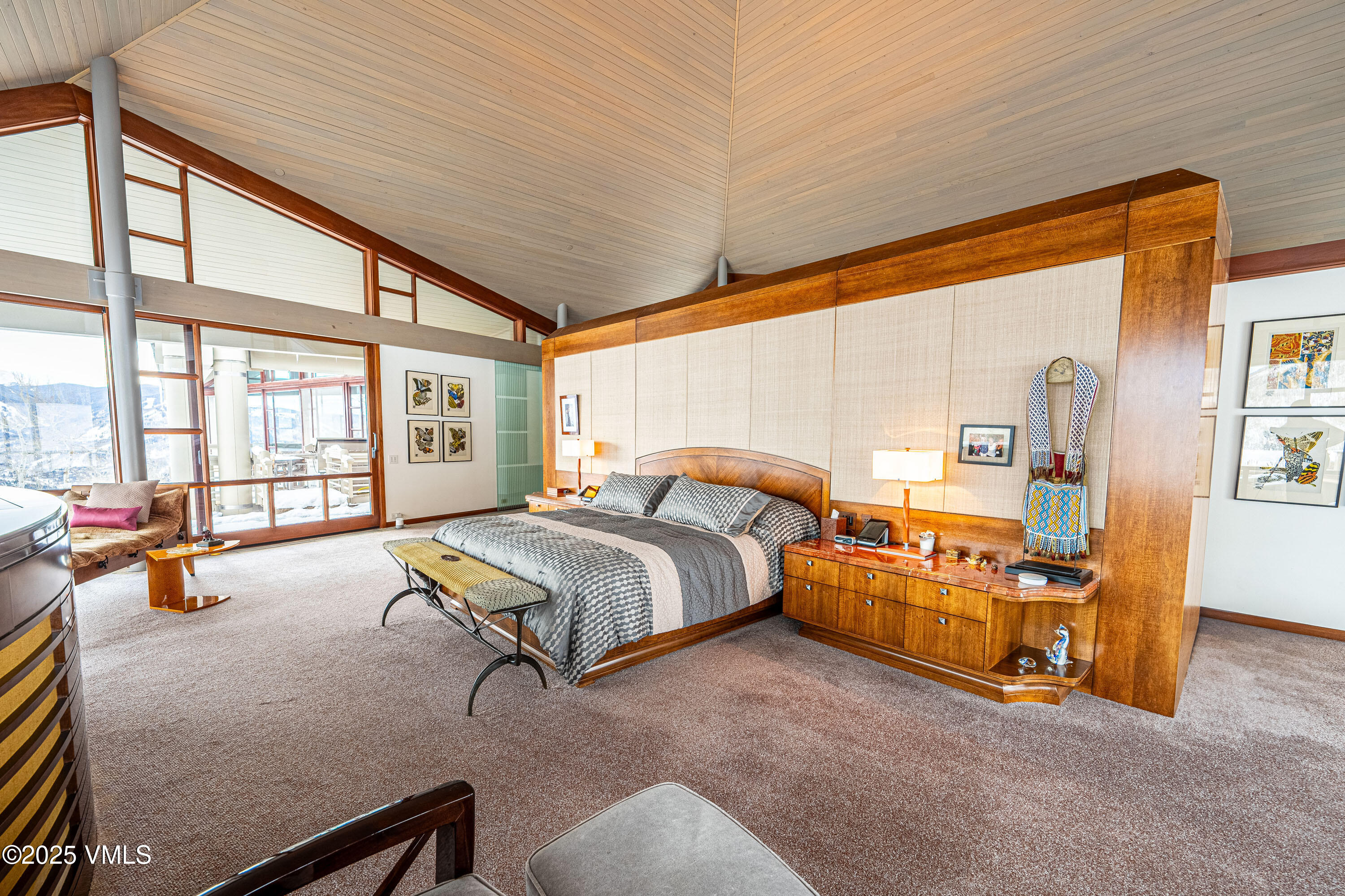 56 Rose Crown Avon, CO 81620 - Photo 15 of 39 a bedroom with furniture and large windows