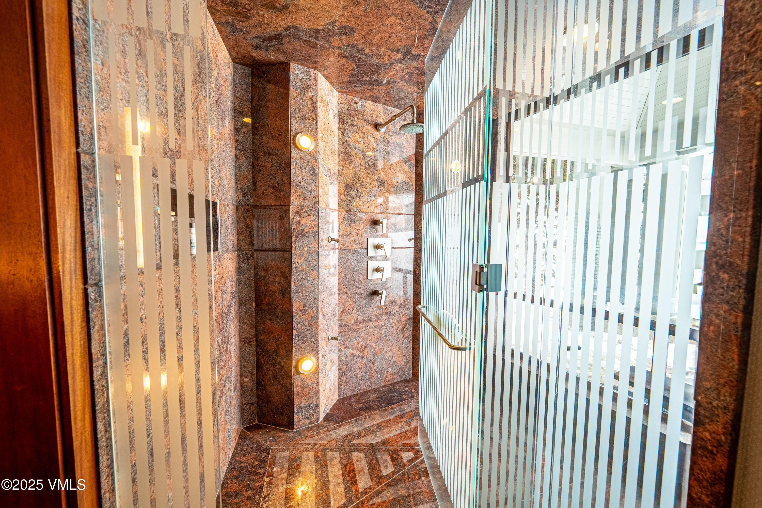 56 Rose Crown Avon, CO 81620 - Photo 16 of 39 a view of a bathroom with a shower and a window
