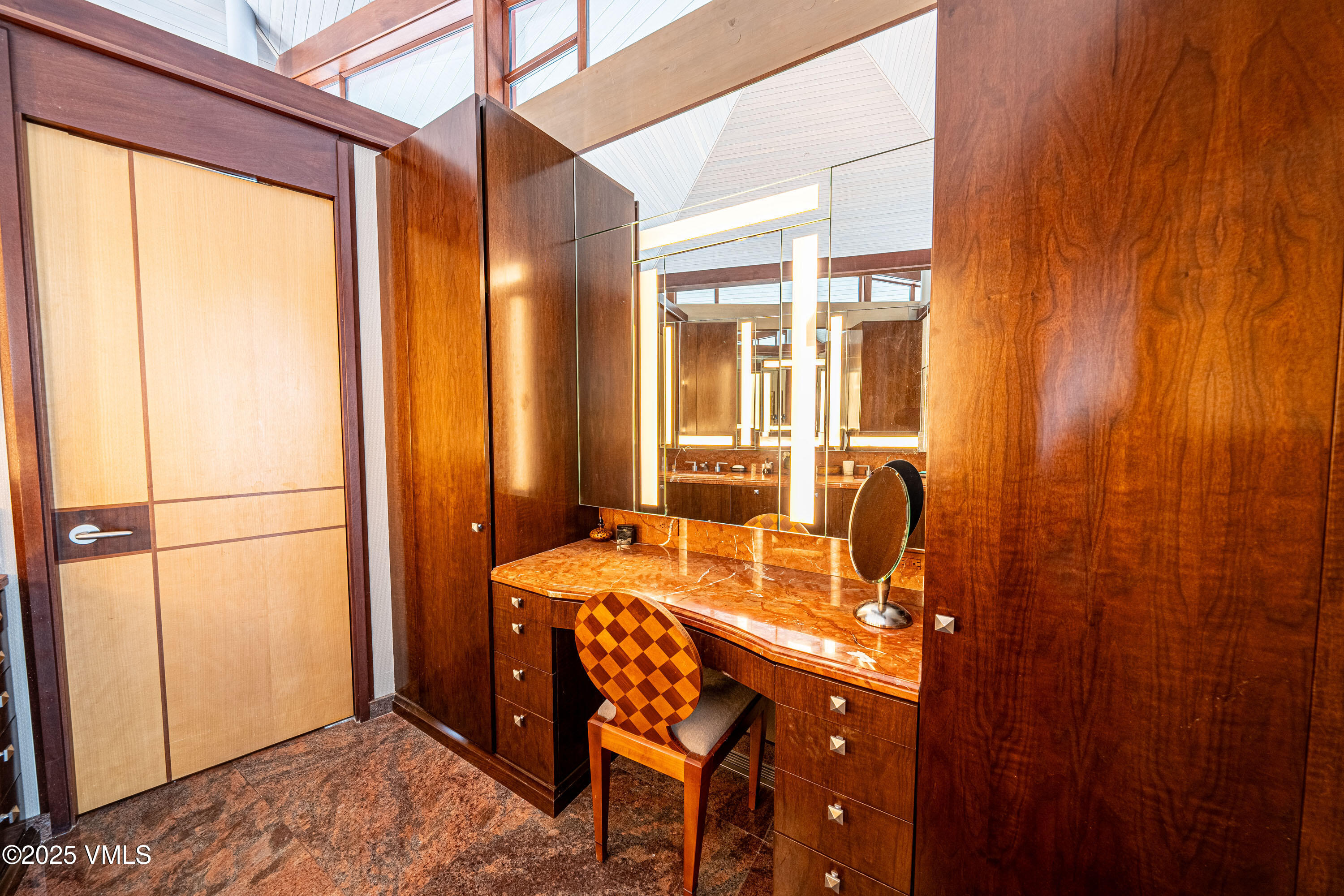 56 Rose Crown Avon, CO 81620 - Photo 18 of 39 a bathroom with a sink and a mirror