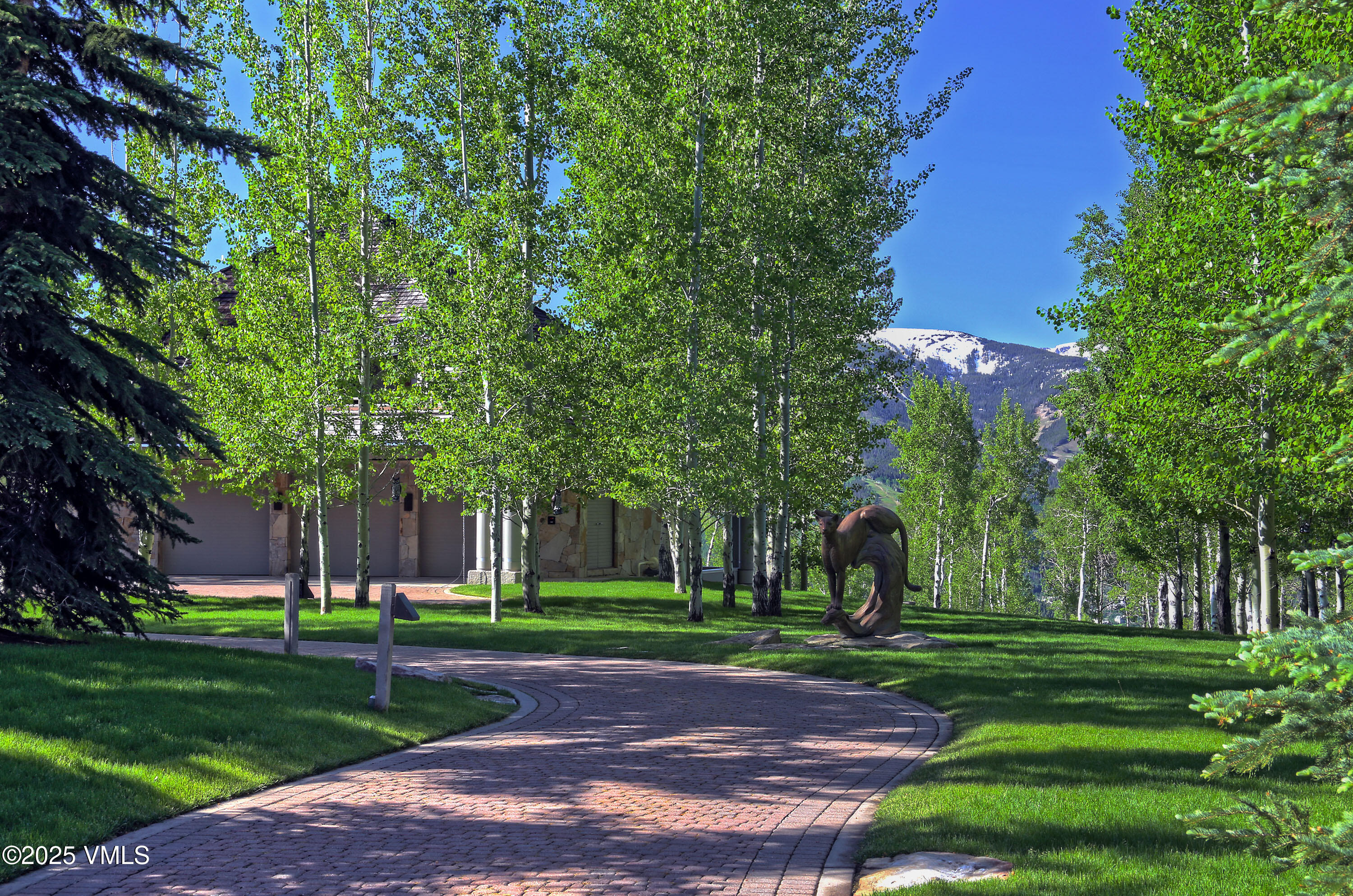 56 Rose Crown Avon, CO 81620 - Photo 2 of 39 a huge green field with lots of trees