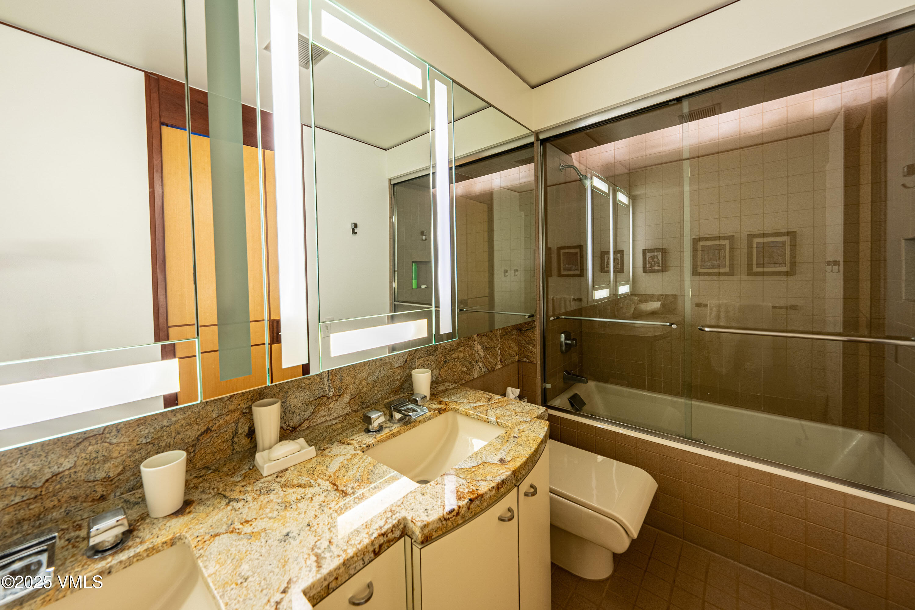 56 Rose Crown Avon, CO 81620 - Photo 22 of 39 a bathroom with a granite countertop sink toilet and shower
