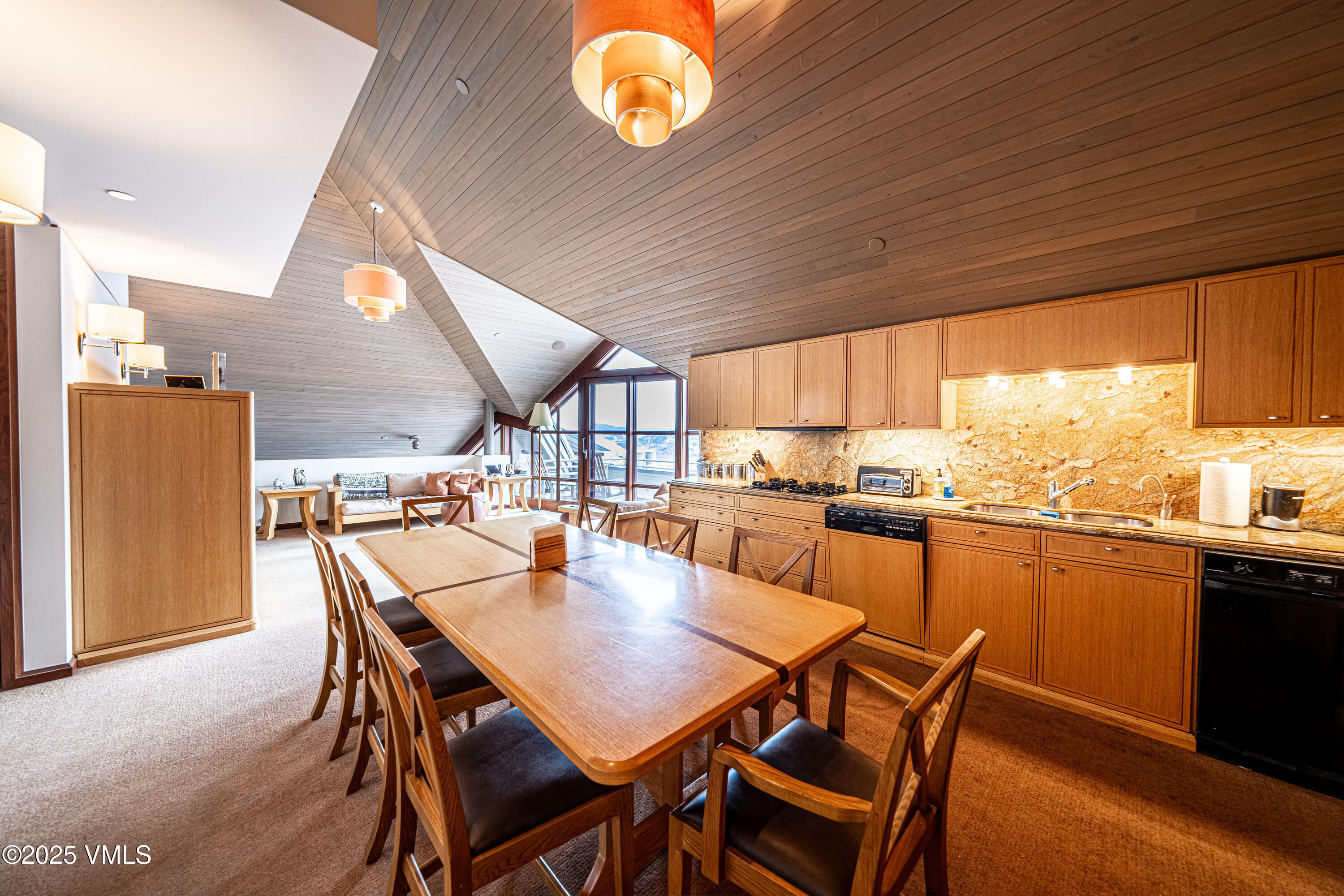 56 Rose Crown Avon, CO 81620 - Photo 24 of 39 a dining room with furniture and window