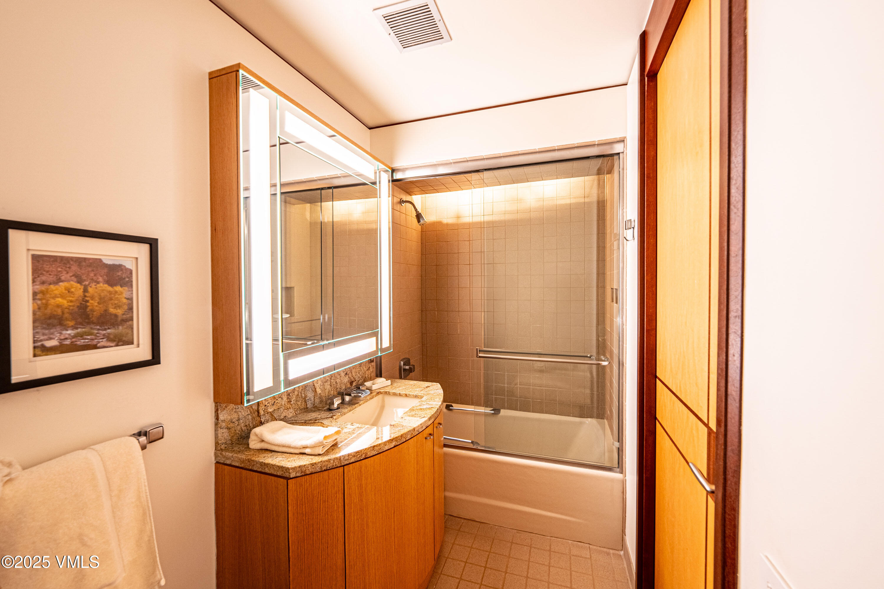 56 Rose Crown Avon, CO 81620 - Photo 26 of 39 a bathroom with a bathtub and a shower