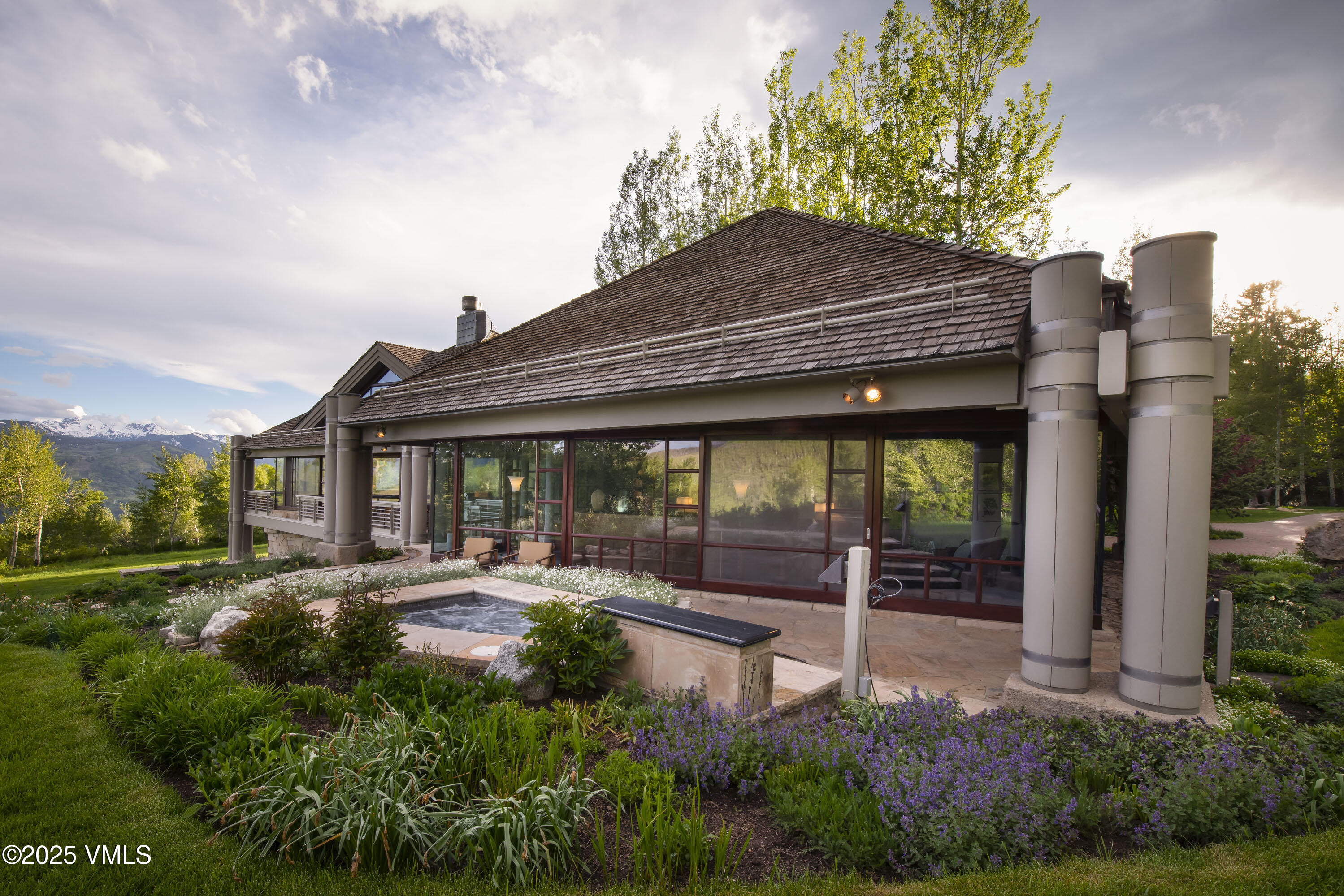 56 Rose Crown Avon, CO 81620 - Photo 33 of 39 a backyard of a house with yard table and chairs