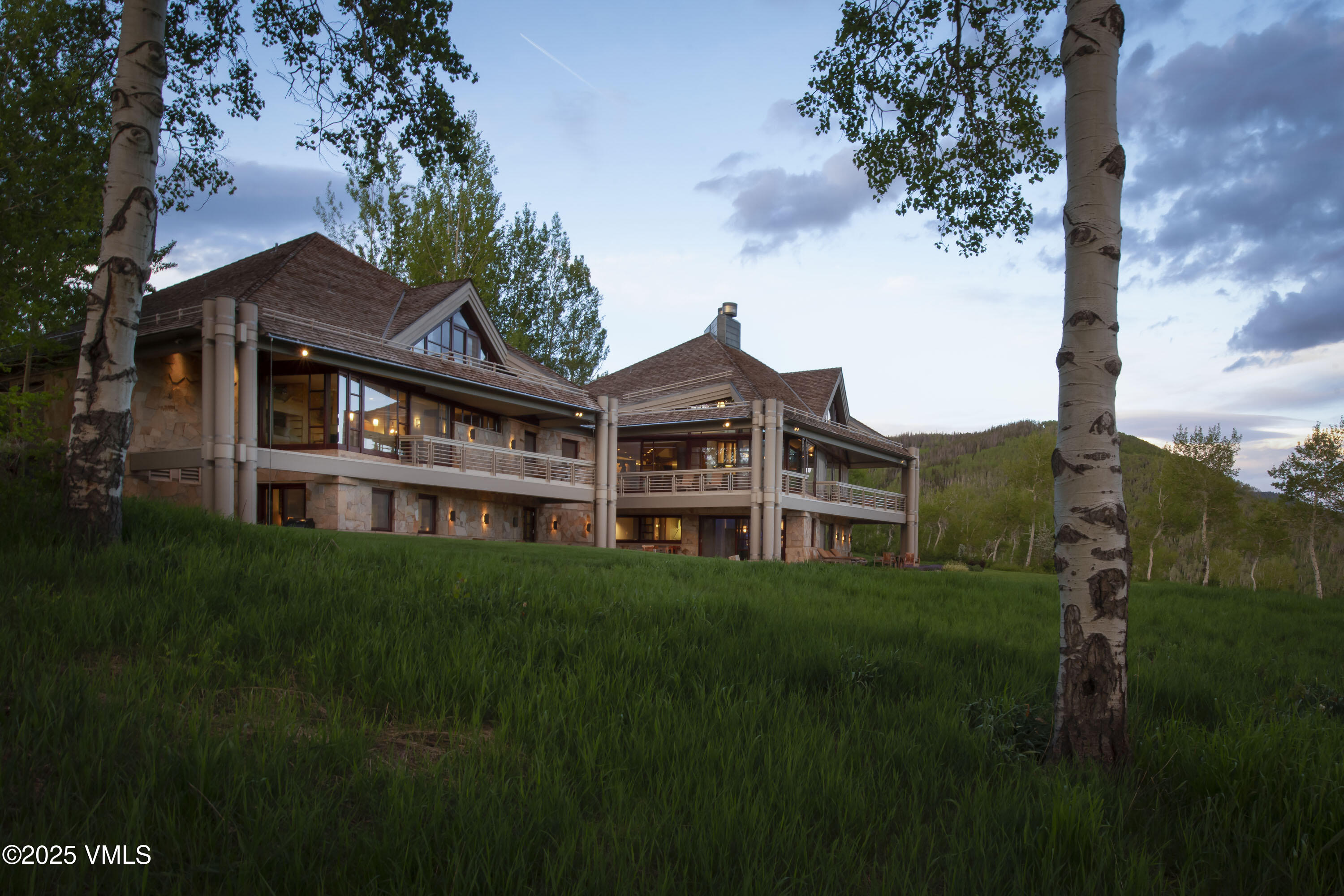 56 Rose Crown Avon, CO 81620 - Photo 35 of 39 a front view of a house with a garden