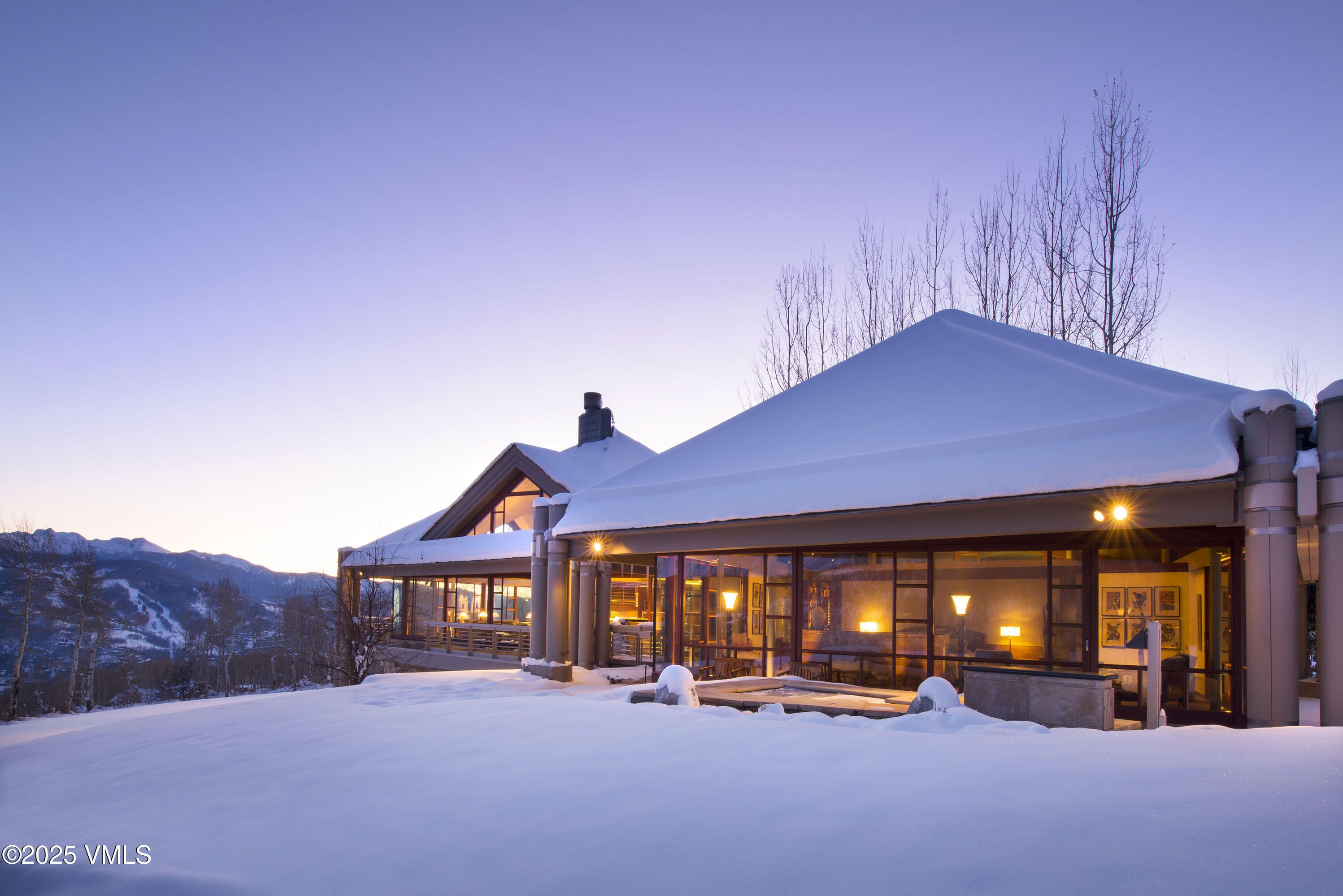 56 Rose Crown Avon, CO 81620 - Photo 38 of 39 a view of a house with large trees and a big yard