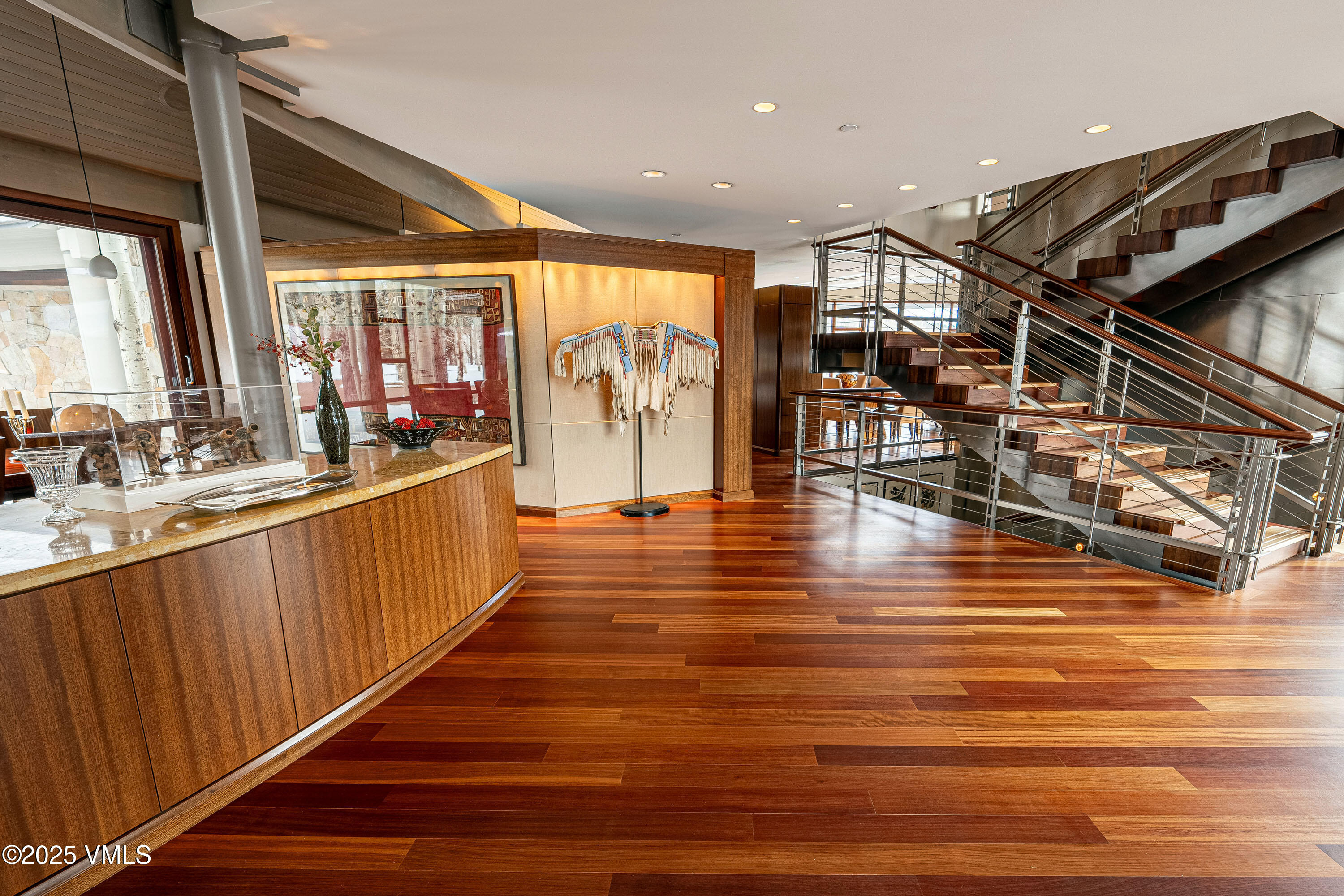 56 Rose Crown Avon, CO 81620 - Photo 4 of 39 a very nice looking room with wooden floor and a window