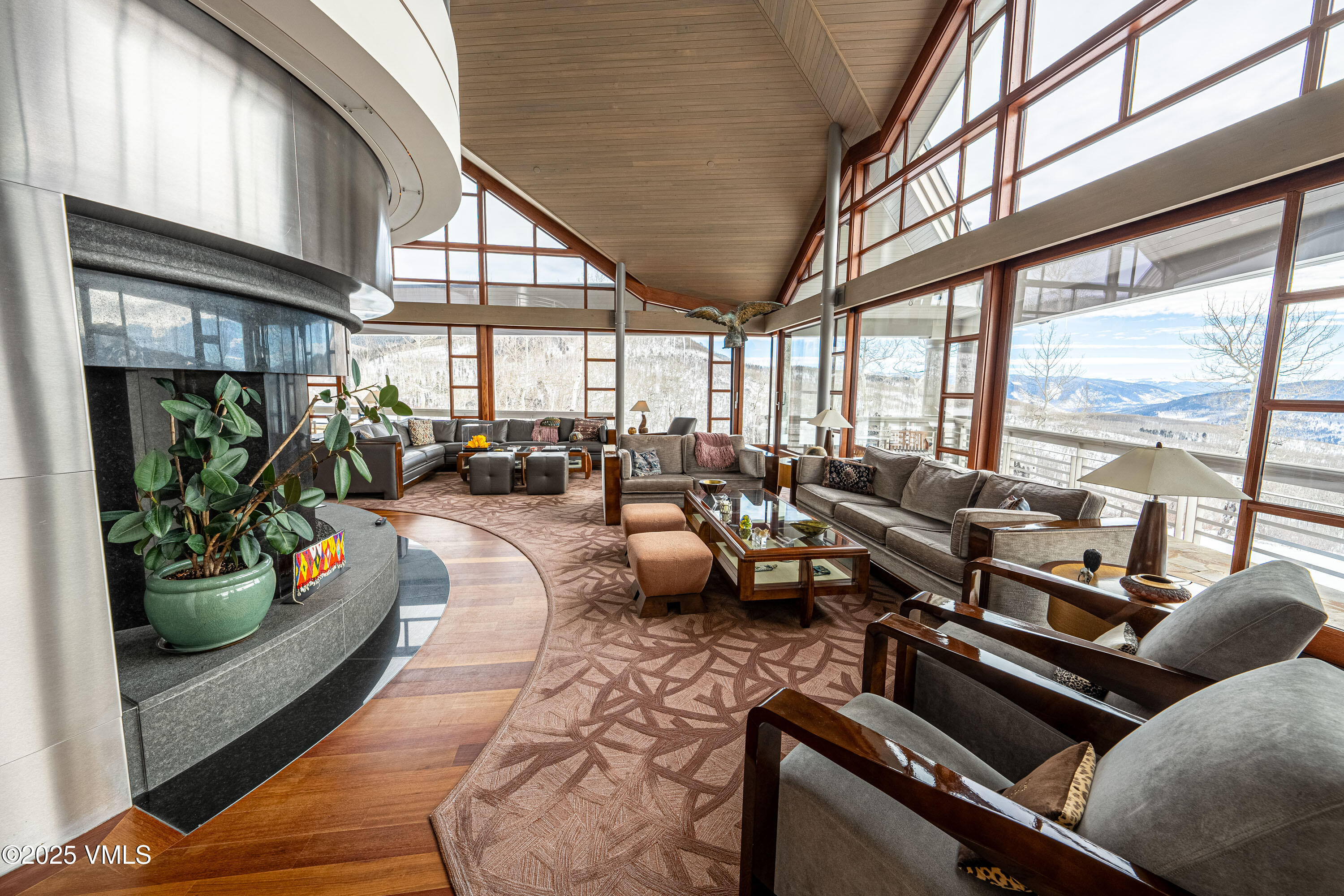 56 Rose Crown Avon, CO 81620 - Photo 5 of 39 a living room with lots of furniture and a large window