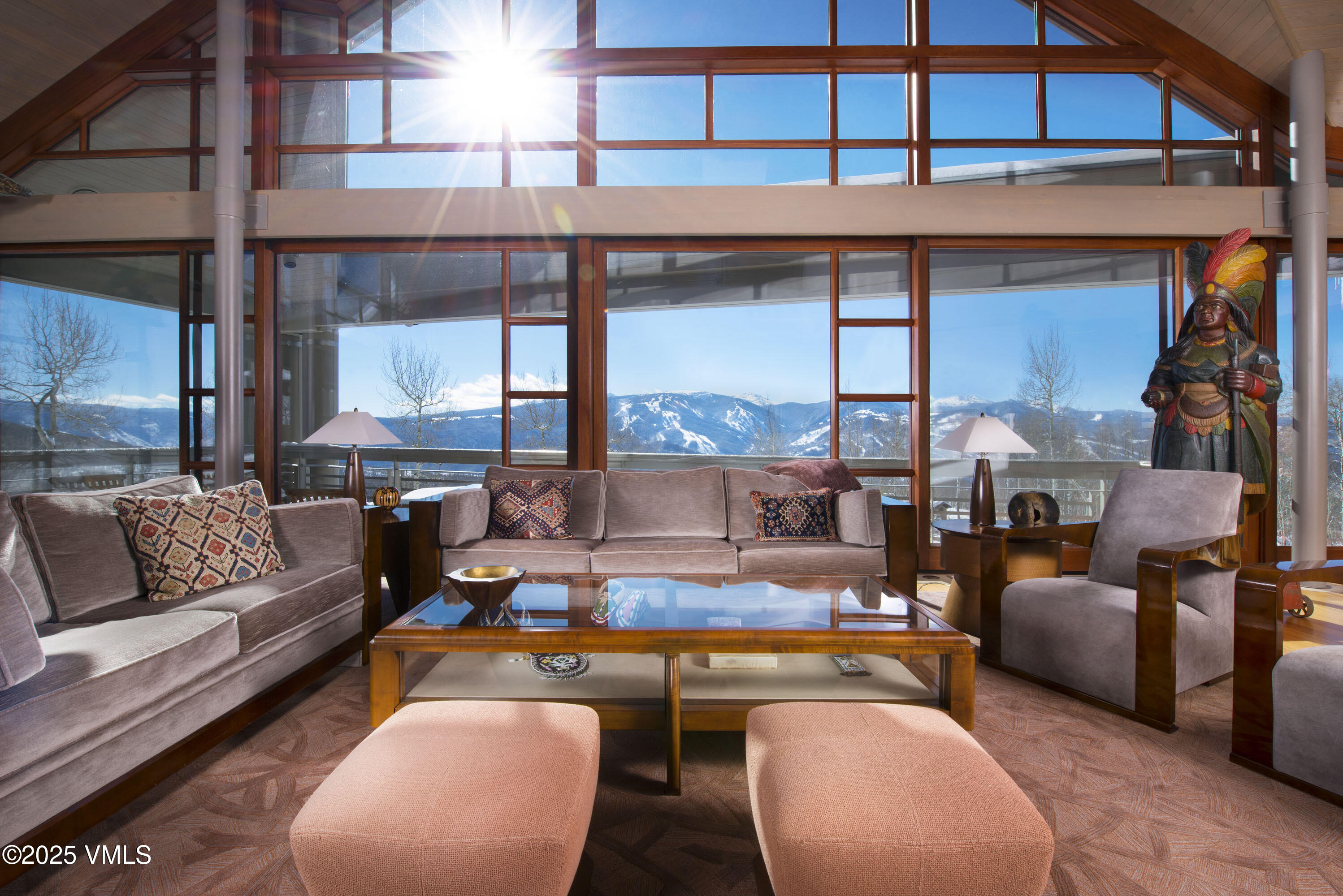 56 Rose Crown Avon, CO 81620 - Photo 8 of 39 a living room with furniture a rug and a large window