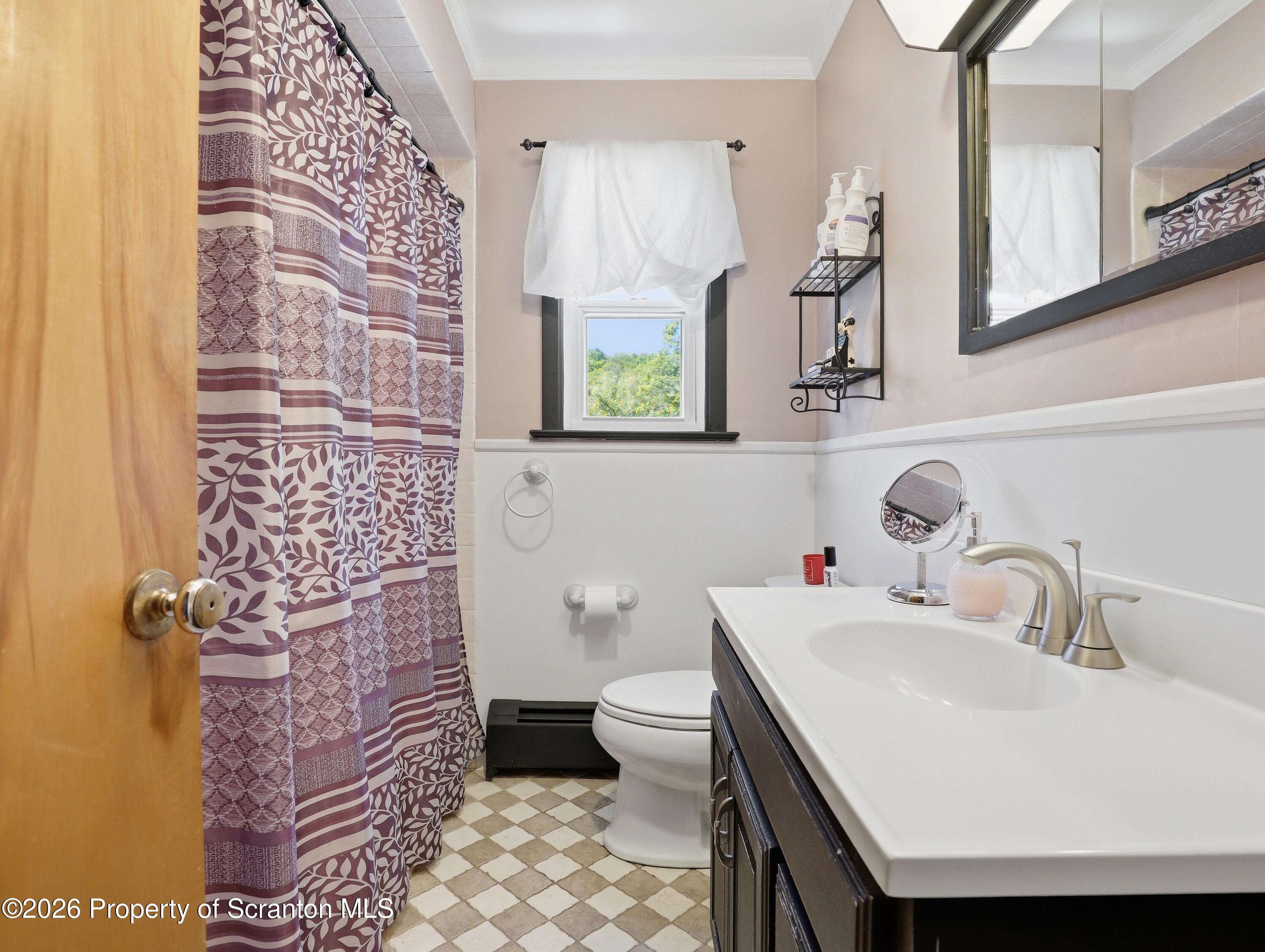 1237 Heart Lake Road Scott Township, PA 18433 - Photo 11 of 39 a bathroom with a sink a toilet and shower curtain