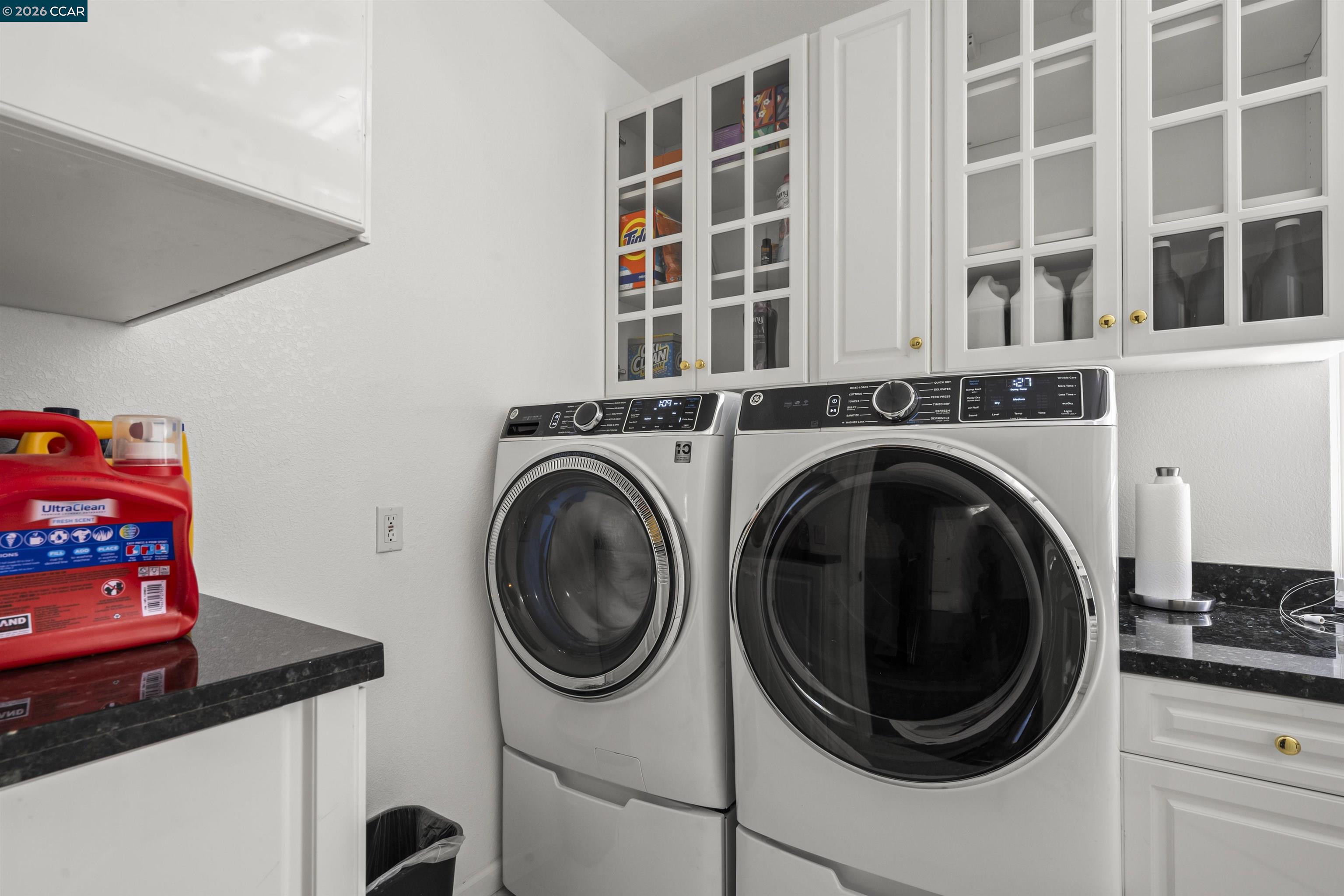 177 Oak Road Alamo, CA 94507 - Photo 35 of 85 a view of a hallway with washer and dryer