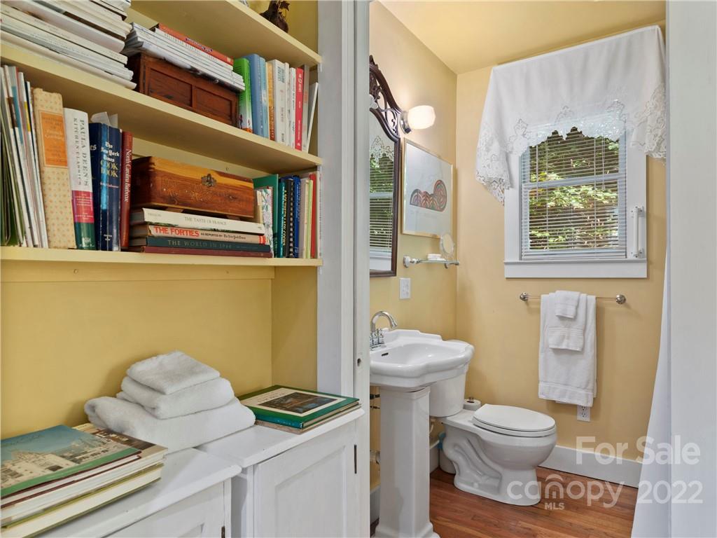 695 County Road Waynesville, NC 28785 - Photo 15 of 21 a bathroom with a toilet and a sink