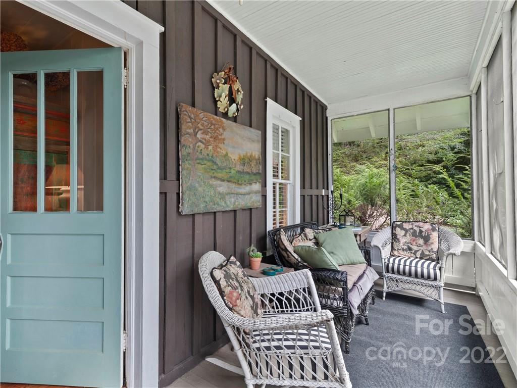 695 County Road Waynesville, NC 28785 - Photo 8 of 21 a balcony with furniture and floor to ceiling window