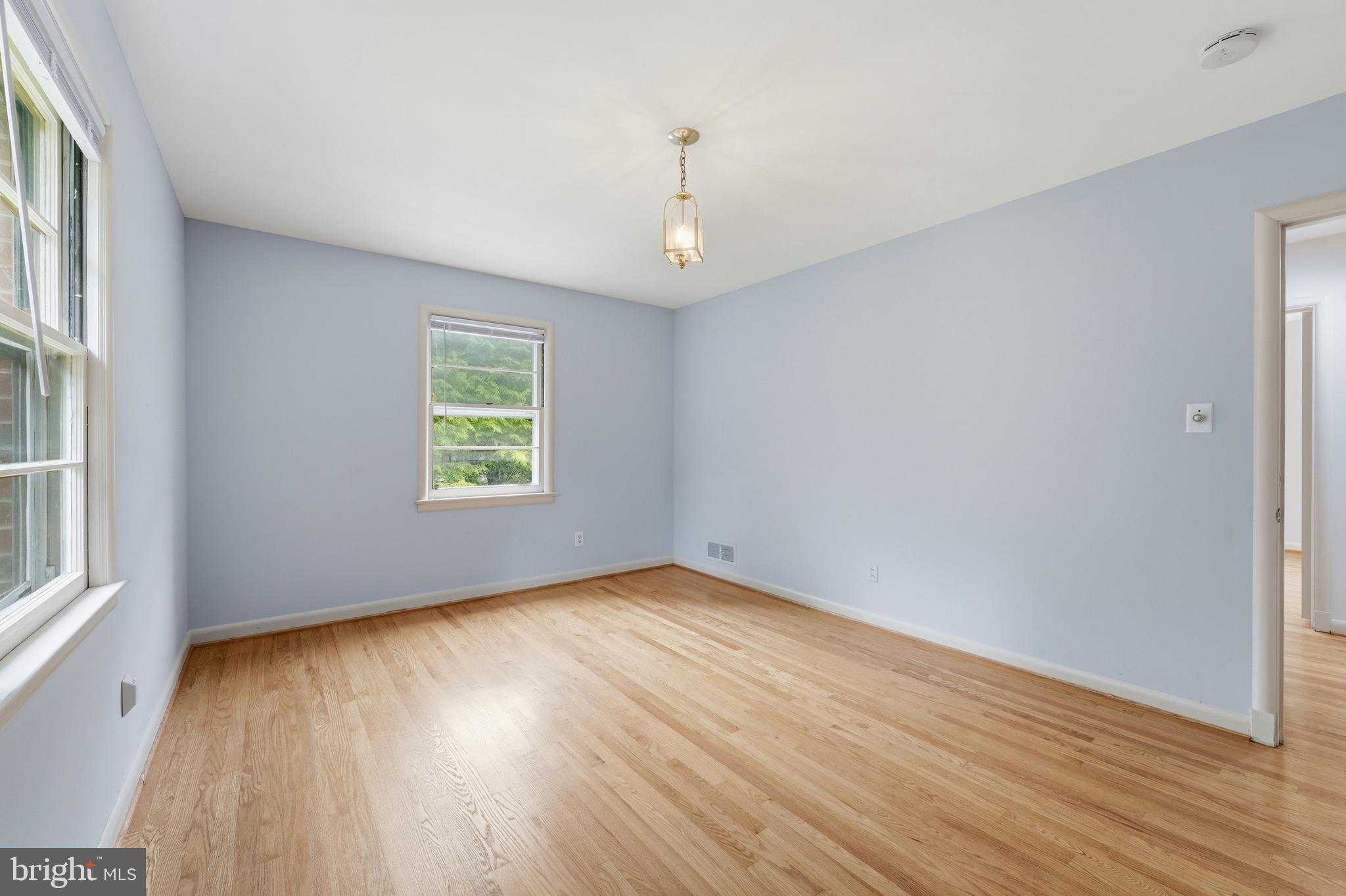 228 Northwest Terrace Silver Spring, MD 20901 - Photo 27 of 70 wooden floor in an empty room with a window