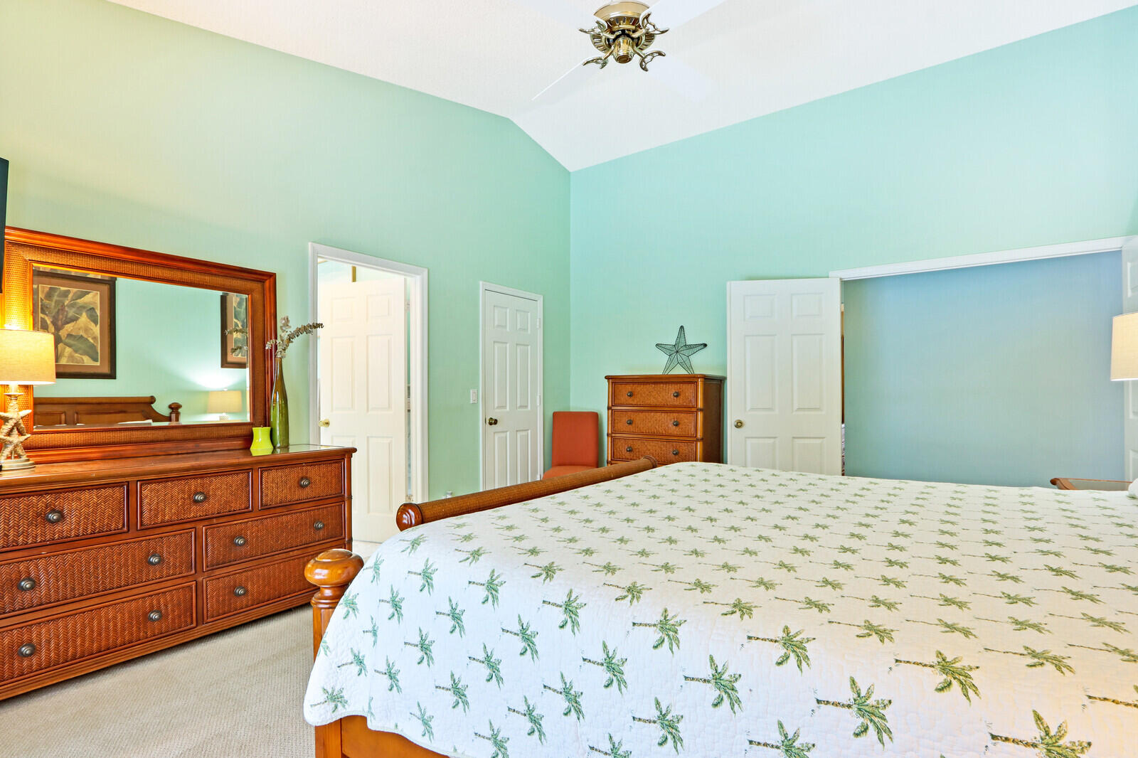 905 Sandy Oaks Drive Jupiter, FL 33477 - Photo 21 of 51 a bedroom with a bed and a dresser in it