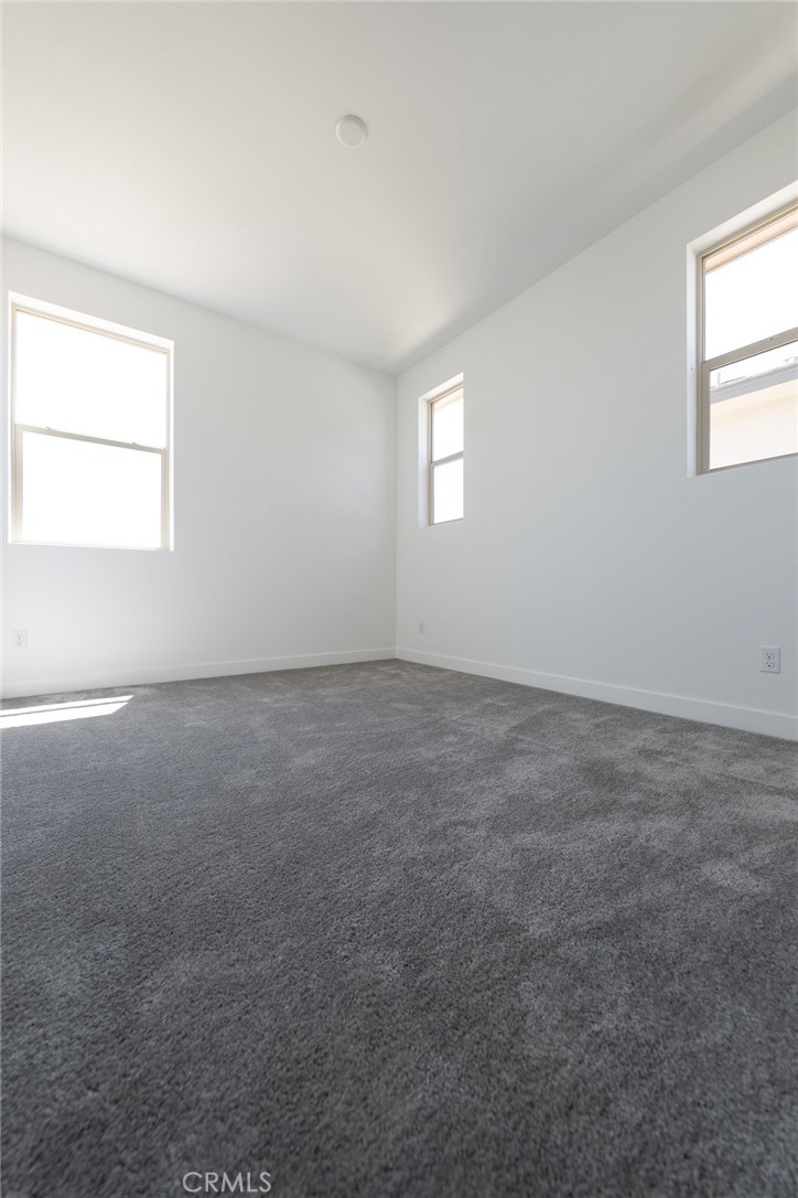 35878 McCarthy Street Palm Desert, CA 92211 - Photo 15 of 26 an empty room with a window