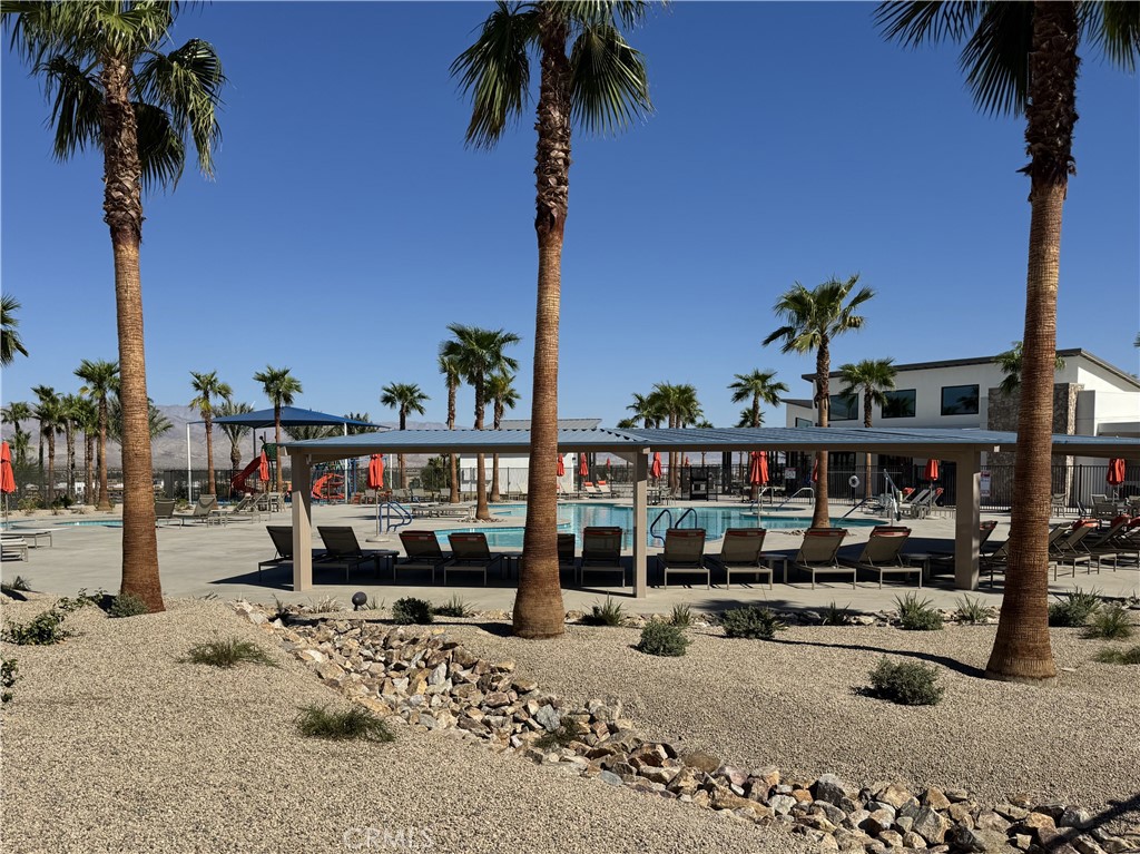 35878 McCarthy Street Palm Desert, CA 92211 - Photo 2 of 26 a view of a street with palm trees