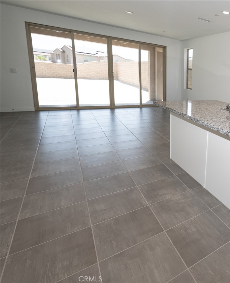 35878 McCarthy Street Palm Desert, CA 92211 - Photo 21 of 26 a view of an empty room with a window