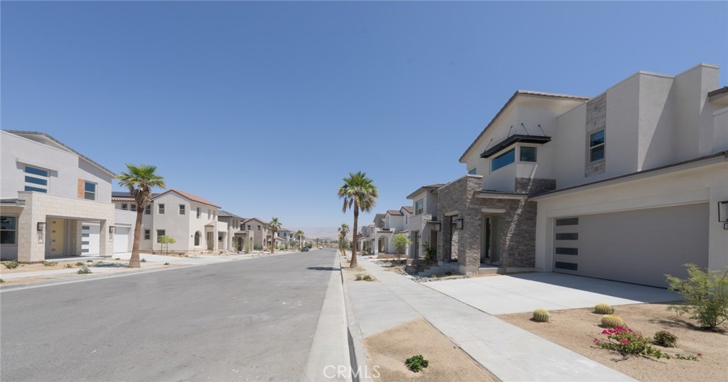 35878 McCarthy Street Palm Desert, CA 92211 - Photo 23 of 26 a view of a house with a outdoor space
