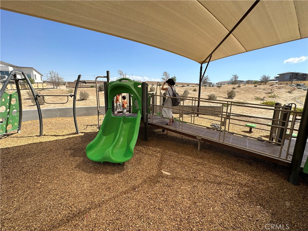35878 McCarthy Street Palm Desert, CA 92211 - Photo 26 of 26 a view of a balcony with chairs