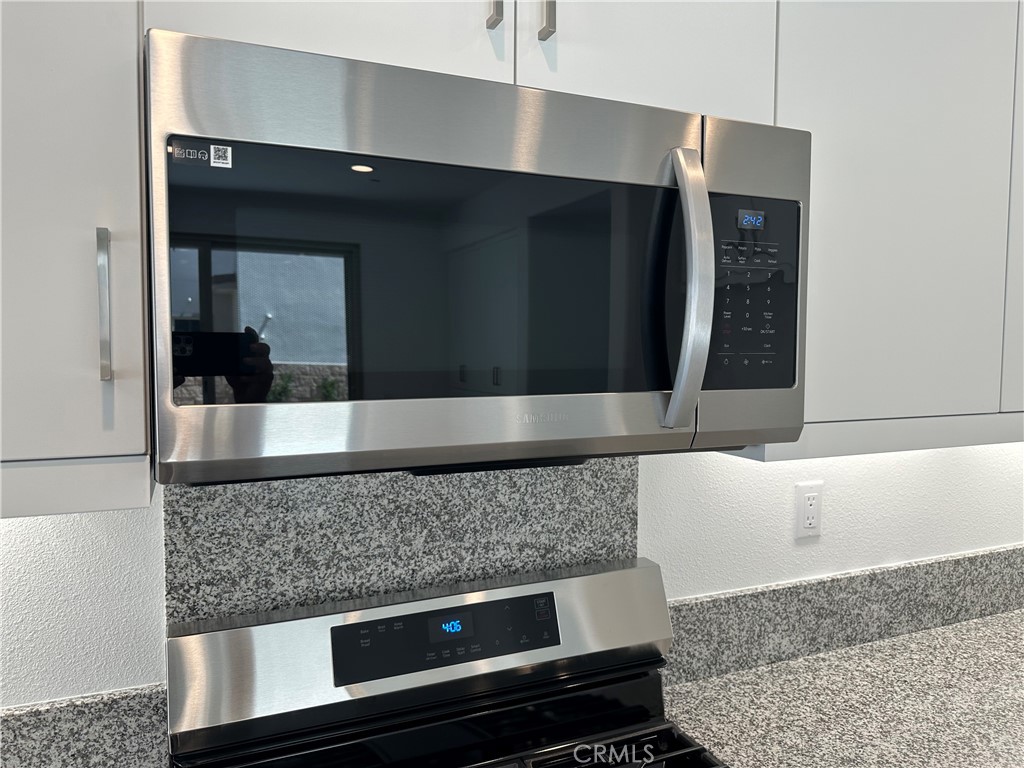 35878 McCarthy Street Palm Desert, CA 92211 - Photo 6 of 26 a bathroom with a bathtub and a sink