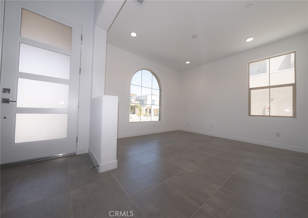 35878 McCarthy Street Palm Desert, CA 92211 - Photo 8 of 26 an empty room with windows