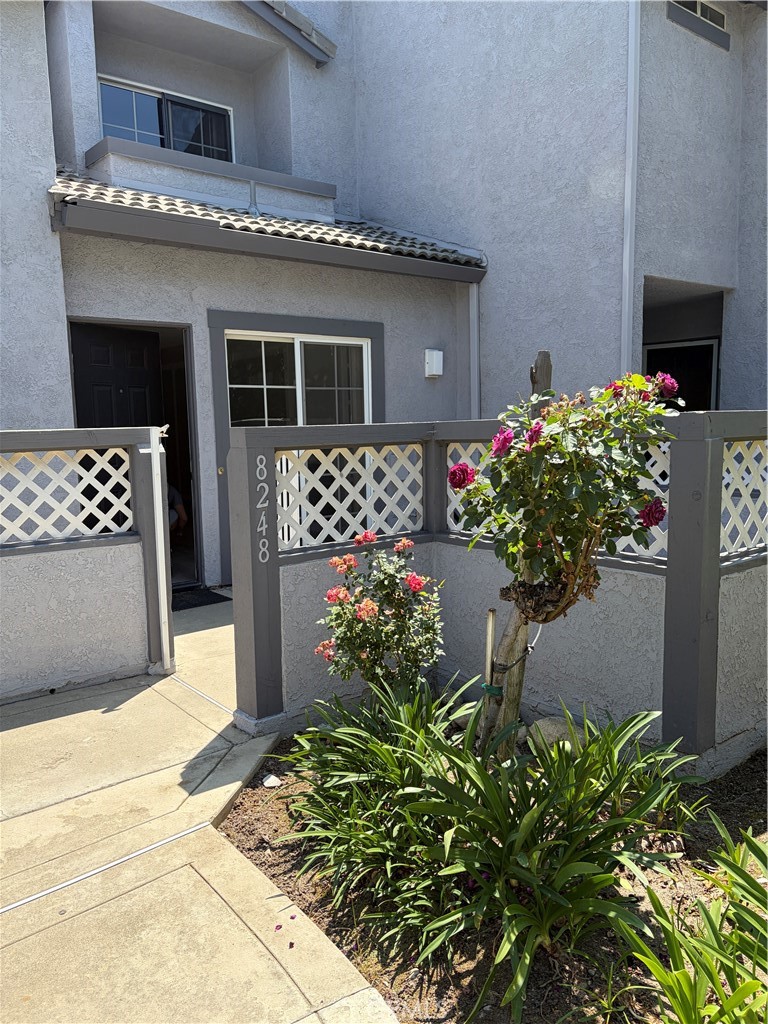8248 Inglenook Place Rancho Cucamonga, CA 91730 - Photo 10 of 12 a front view of a house with a yard