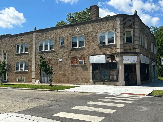 a view of a building with a street