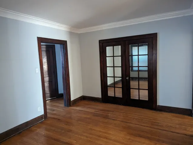 wooden floor and windows in a room