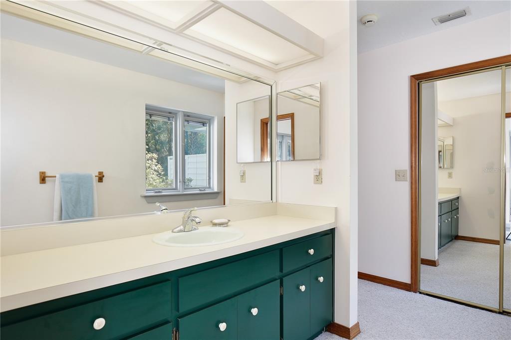 183 Parsons Road Longwood, FL 32779 - Photo 26 of 100 a bathroom with a sink double vanity and a mirror