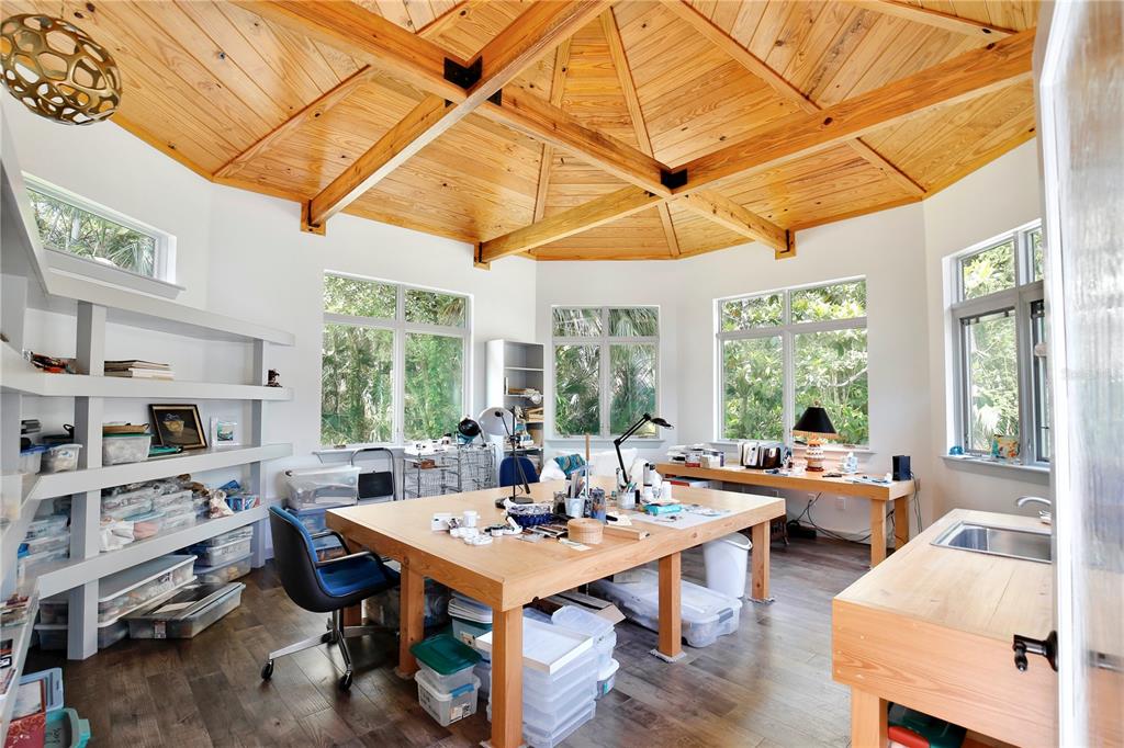 183 Parsons Road Longwood, FL 32779 - Photo 28 of 100 a view of a dining room with furniture large windows and wooden floor