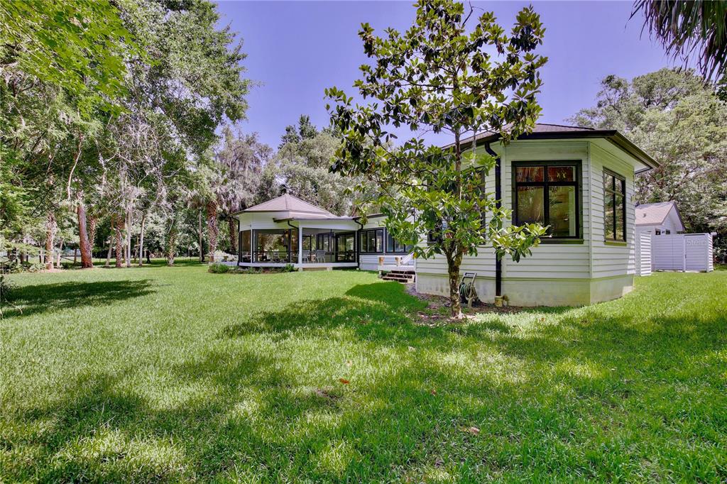 183 Parsons Road Longwood, FL 32779 - Photo 42 of 100 a front view of a house with garden