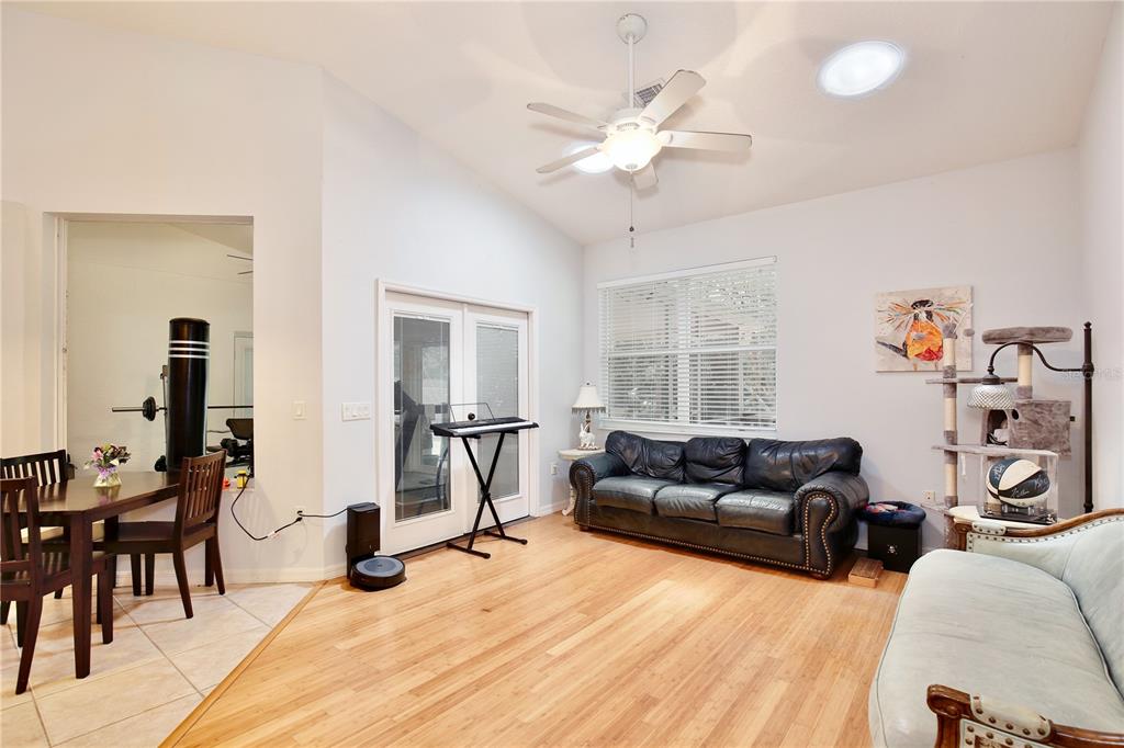 183 Parsons Road Longwood, FL 32779 - Photo 78 of 100 a living room with furniture and a flat screen tv