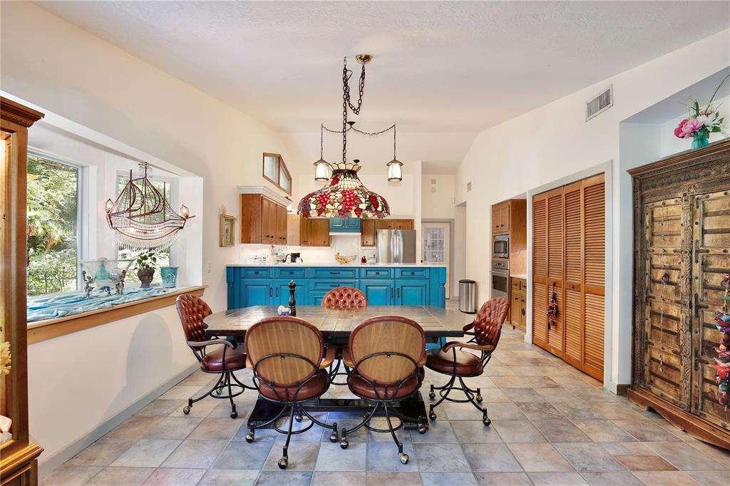 183 Parsons Road Longwood, FL 32779 - Photo 8 of 100 a view of a dining room with furniture window and outside view
