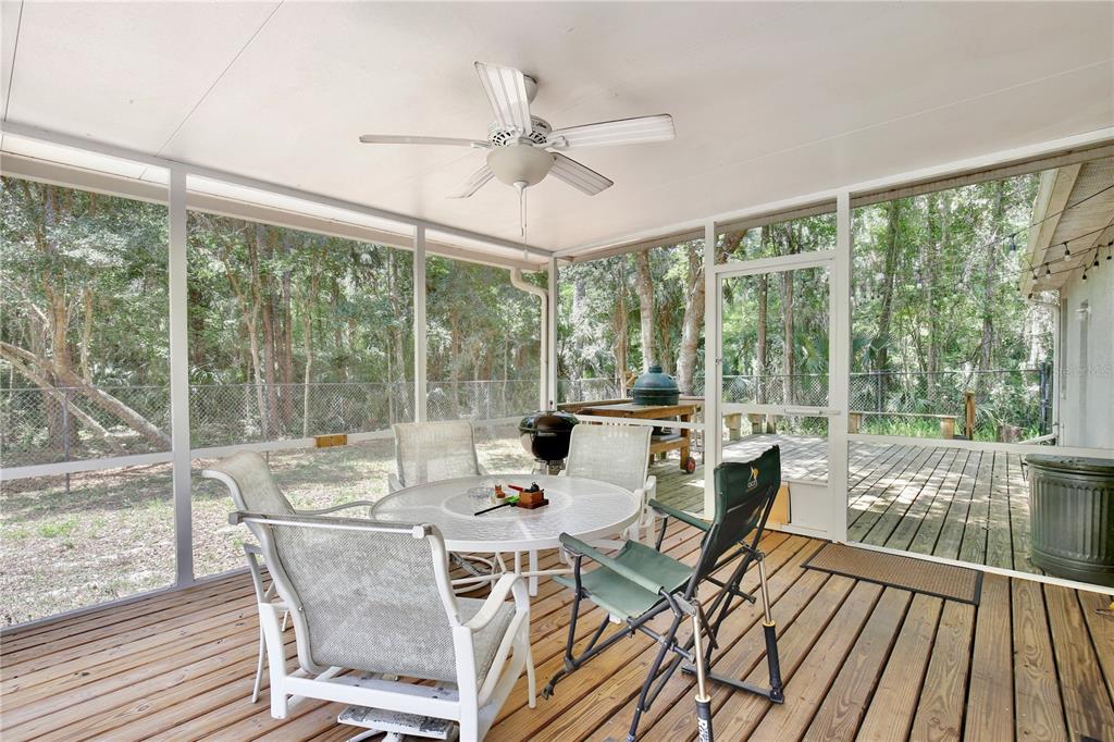 183 Parsons Road Longwood, FL 32779 - Photo 94 of 100 a view of a dining room with furniture large windows and wooden floor