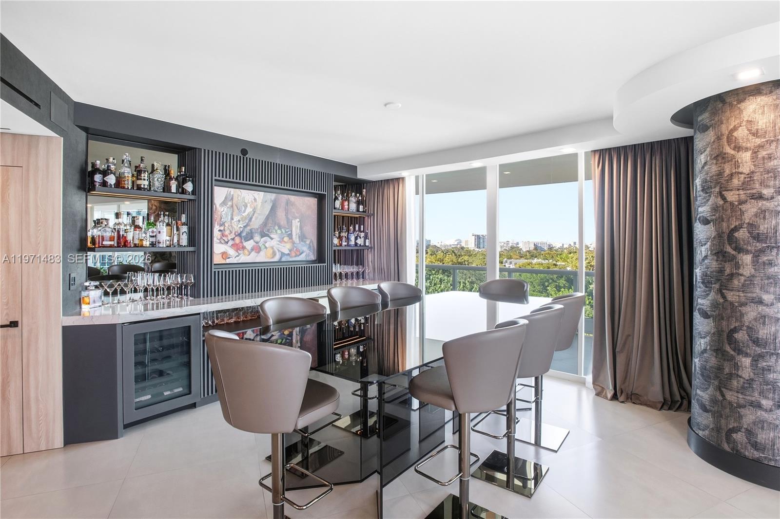 2127 Brickell Avenue, Unit 904 Miami, FL 33129 - Photo 11 of 38 a living room with furniture and a large window