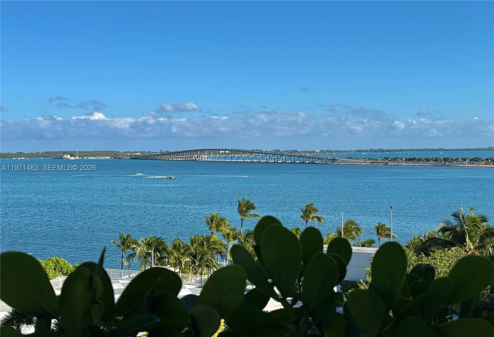 2127 Brickell Avenue, Unit 904 Miami, FL 33129 - Photo 17 of 38 a view of a lake with a mountain in the background