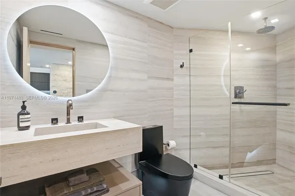 a view of a hallway with washer and dryer