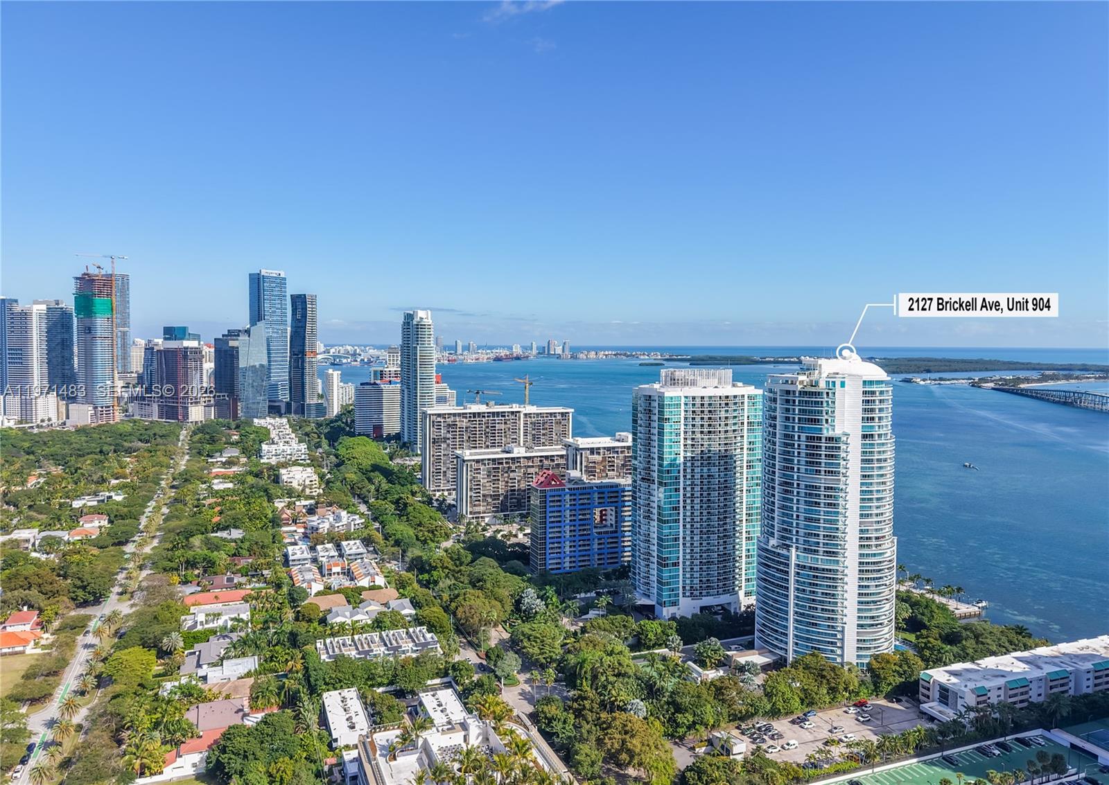 2127 Brickell Avenue, Unit 904 Miami, FL 33129 - Photo 35 of 38 a view of a city with tall buildings