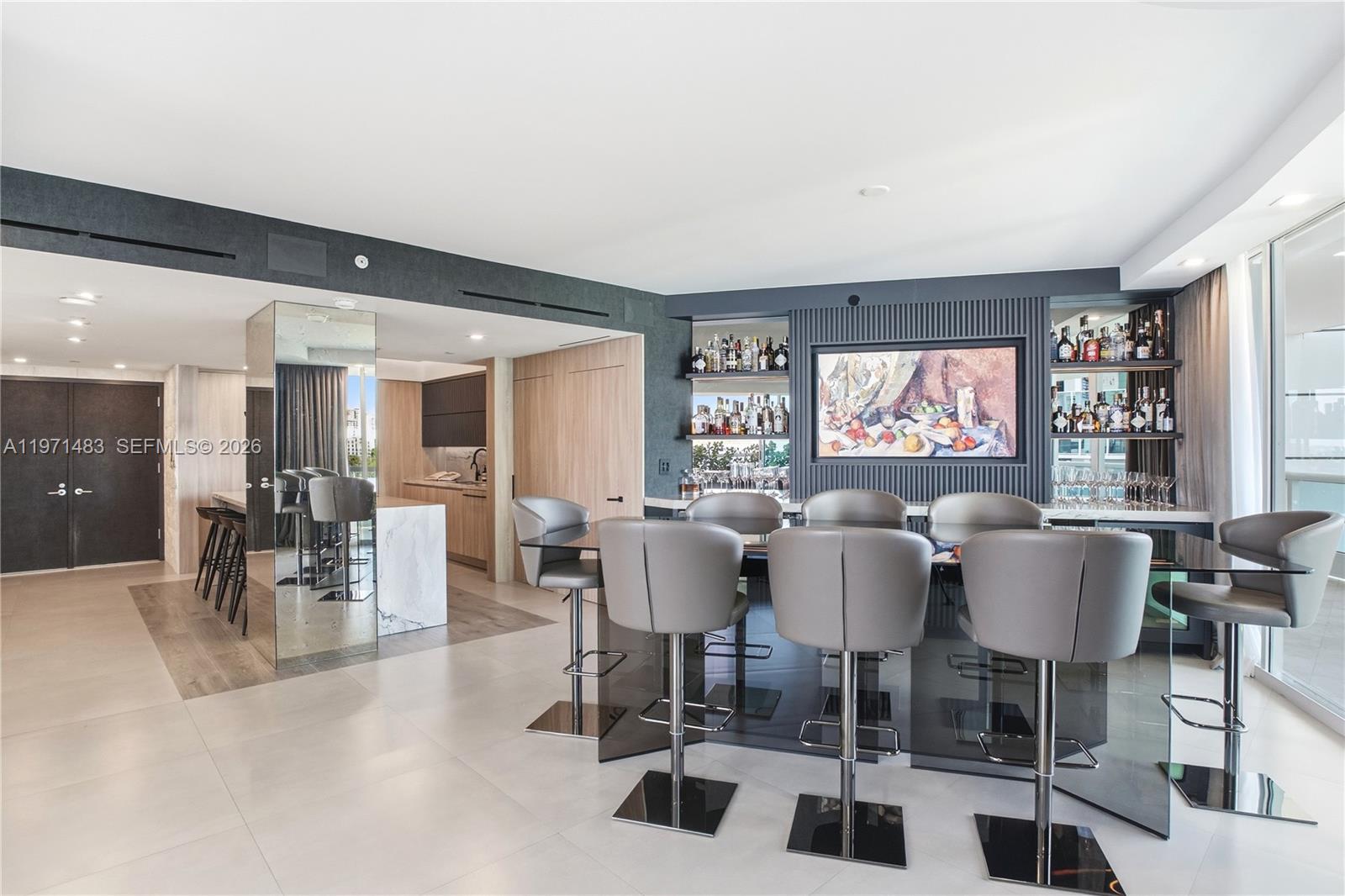 2127 Brickell Avenue, Unit 904 Miami, FL 33129 - Photo 10 of 38 a dining room with furniture and window