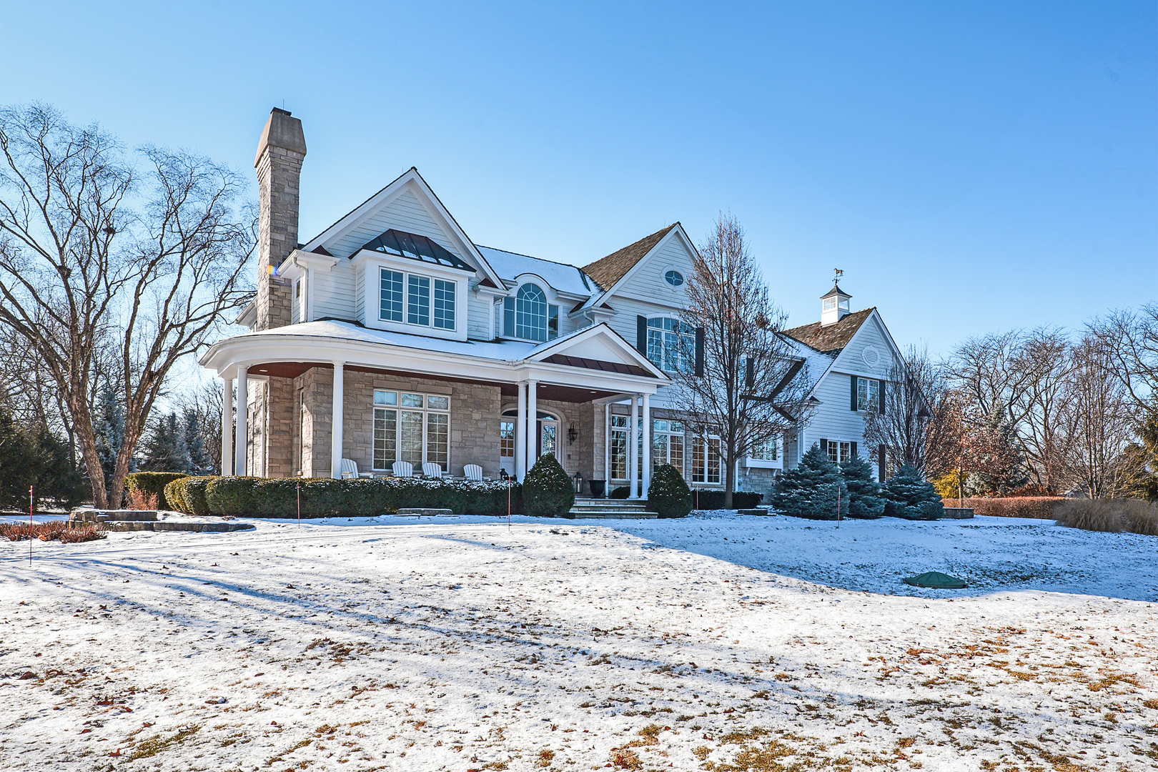 1773 Pheasant Trail Inverness, IL 60067 - Photo 2 of 54 a front view of a house with a yard