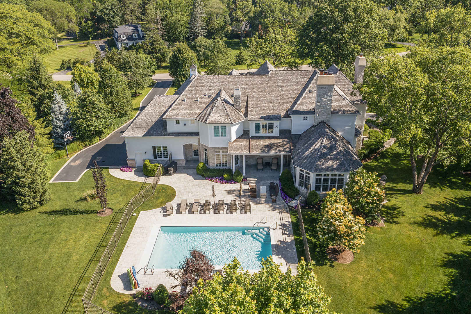1773 Pheasant Trail Inverness, IL 60067 - Photo 3 of 54 an aerial view of a house with swimming pool garden and patio